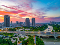 A photo is showing the North-South Geographical Boundary indication Garden in the Chaoxia district of Huai'an City, Jiangsu province, China,...