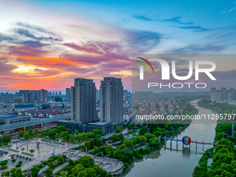 A photo is showing the North-South Geographical Boundary indication Garden in the Chaoxia district of Huai'an City, Jiangsu province, China,...