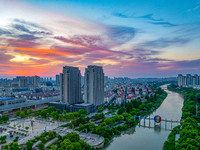 A photo is showing the North-South Geographical Boundary indication Garden in the Chaoxia district of Huai'an City, Jiangsu province, China,...