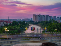 A photo is showing the North-South Geographical Boundary indication Garden in the Chaoxia district of Huai'an City, Jiangsu province, China,...