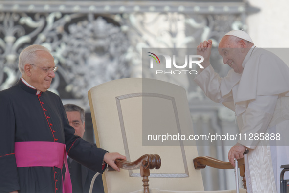 Pope Francis is gesturing during the weekly general audience in The Vatican, on May 29, 2024, at St Peter's Square. 