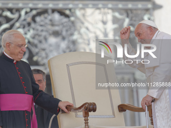 Pope Francis is gesturing during the weekly general audience in The Vatican, on May 29, 2024, at St Peter's Square. (