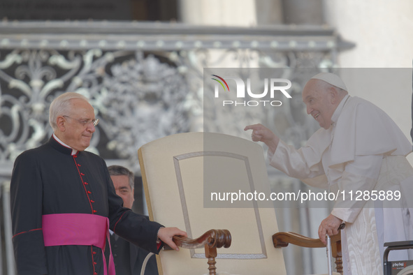 Pope Francis is gesturing during the weekly general audience in The Vatican, on May 29, 2024, at St Peter's Square. 