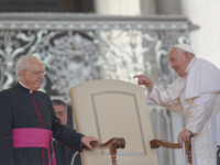 Pope Francis is gesturing during the weekly general audience in The Vatican, on May 29, 2024, at St Peter's Square. (