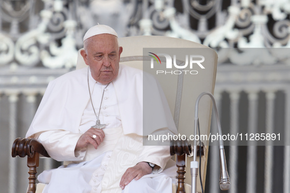 Pope Francis is leading his Wednesday general audience in St Peter's Square at the Vatican, on May 29, 2024. 