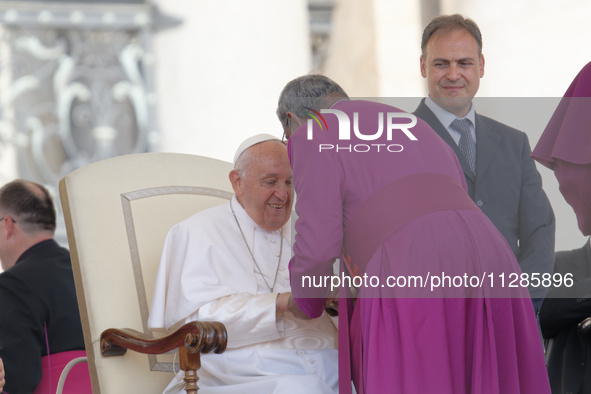 Pope Francis is leading his Wednesday general audience in St Peter's Square at the Vatican, on May 29, 2024. 