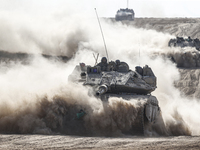 Mobility Of Tanks, Armored Personnel Carriers, Trucks And Military Jeeps Belonging To The Israeli Army Continues On The Border Line Near The...