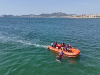 Rescuers are conducting a training to rescue drowning at sea in Yantai, China, on May 29, 2024. (