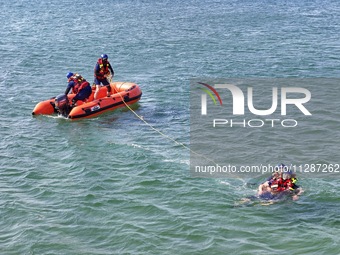 Rescuers are conducting a training to rescue drowning at sea in Yantai, China, on May 29, 2024. (