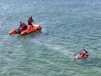 Rescuers are conducting a training to rescue drowning at sea in Yantai, China, on May 29, 2024. (