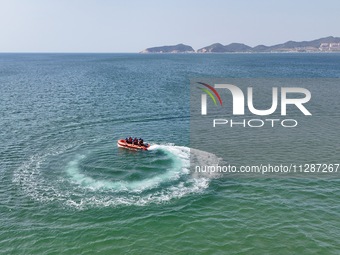 Rescuers are conducting a training to rescue drowning at sea in Yantai, China, on May 29, 2024. (