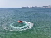 Rescuers are conducting a training to rescue drowning at sea in Yantai, China, on May 29, 2024. (