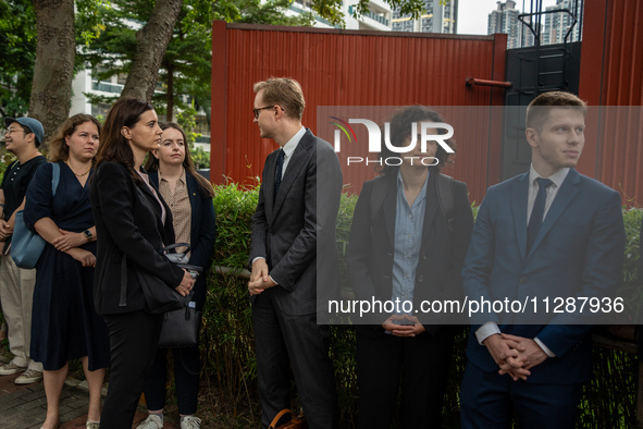 Representatives from consulates are waiting outside the courthouse to hear the verdict of the trial of the 47 pro-democracy figures in Hong...