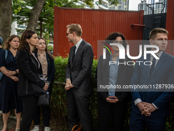 Representatives from consulates are waiting outside the courthouse to hear the verdict of the trial of the 47 pro-democracy figures in Hong...