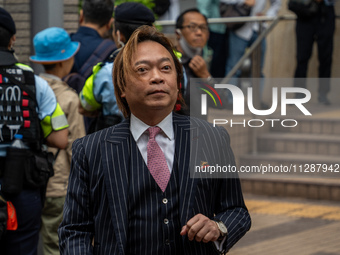 Lawrence Lau Wai-chung, one of the defendants in this case, is arriving at the courthouse where the verdict of the trial of the 47 pro-democ...