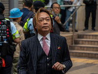 Lawrence Lau Wai-chung, one of the defendants in this case, is arriving at the courthouse where the verdict of the trial of the 47 pro-democ...