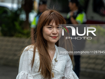 Clarisse Yeung Suet-ying, one of the defendants in this case, is arriving at the courthouse where the verdict of the trial of the 47 pro-dem...