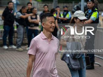 Raymond Chan Chi-chuen, one of the defendants in this case, is arriving at the courthouse where the verdict of the trial of the 47 pro-democ...