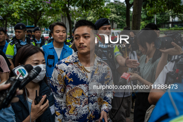 Lee Yue-shun is leaving the courthouse where the verdict of the trial of the 47 Pro-democracy figures is being handed out in Hong Kong, Chin...