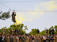 Military training exercises during the graduation ceremony of the Major General Mohammed Al-Faris course in Afrin countryside, northwest Syr...