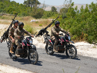 Military training exercises during the graduation ceremony of the Major General Mohammed Al-Faris course in Afrin countryside, northwest Syr...