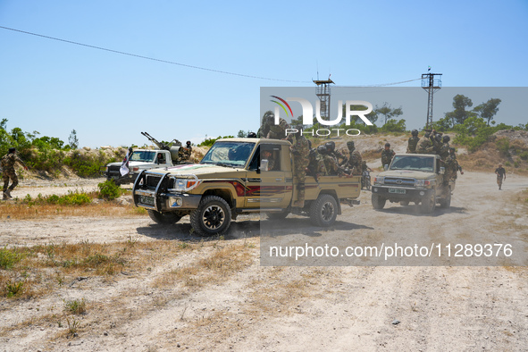 Military training exercises during the graduation ceremony of the Major General Mohammed Al-Faris course in Afrin countryside, northwest Syr...