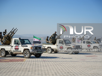 Military training exercises during the graduation ceremony of the Major General Mohammed Al-Faris course in Afrin countryside, northwest Syr...