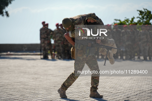 Military training exercises during the graduation ceremony of the Major General Mohammed Al-Faris course in Afrin countryside, northwest Syr...