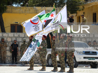 Military training exercises during the graduation ceremony of the Major General Mohammed Al-Faris course in Afrin countryside, northwest Syr...