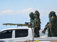 Military training exercises during the graduation ceremony of the Major General Mohammed Al-Faris course in Afrin countryside, northwest Syr...