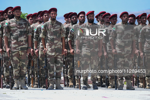 Military training exercises during the graduation ceremony of the Major General Mohammed Al-Faris course in Afrin countryside, northwest Syr...