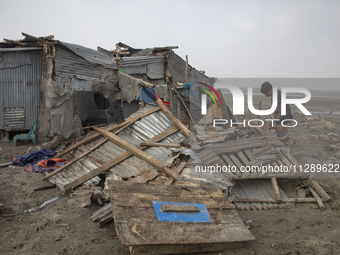 Men are repairing their damaged shop after Cyclone Remal's landfall in Patuakhali, Bangladesh, on May 29, 2024. Cyclone Remal, which made la...