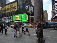 People are walking in Times Square where the machete stabbing is taking place. The New York City Police Department is saying that at approxi...