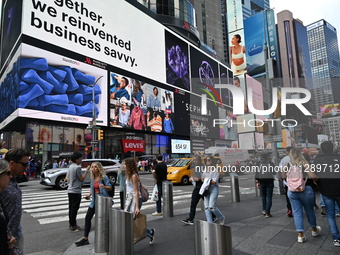 People are walking in Times Square where the machete stabbing is taking place. The New York City Police Department is saying that at approxi...