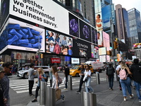 People are walking in Times Square where the machete stabbing is taking place. The New York City Police Department is saying that at approxi...