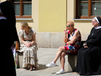 The Corpus Christi procession is walking through the city streets in Krakow, Poland, on May 30, 2024. The Solemnity of the Most Holy Body an...