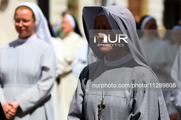 The Corpus Christi procession is walking through the city streets in Krakow, Poland, on May 30, 2024. The Solemnity of the Most Holy Body an...