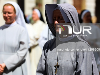 The Corpus Christi procession is walking through the city streets in Krakow, Poland, on May 30, 2024. The Solemnity of the Most Holy Body an...