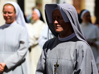 The Corpus Christi procession is walking through the city streets in Krakow, Poland, on May 30, 2024. The Solemnity of the Most Holy Body an...