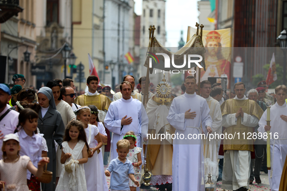 The Corpus Christi procession is walking through the city streets in Krakow, Poland, on May 30, 2024. The Solemnity of the Most Holy Body an...