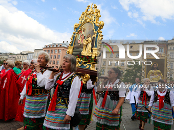 The Corpus Christi procession is walking through the city streets in Krakow, Poland, on May 30, 2024. The Solemnity of the Most Holy Body an...