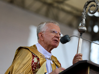 Metropolitan Archbishop of Krakow Marek Jedraszeski is walking through the city streets during the Corpus Christi procession in Krakow, Pola...