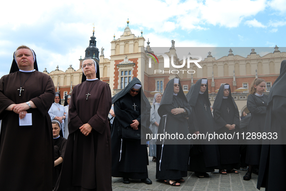 The Corpus Christi procession is walking through the city streets in Krakow, Poland, on May 30, 2024. The Solemnity of the Most Holy Body an...