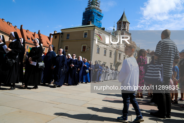 The Corpus Christi procession is walking through the city streets in Krakow, Poland, on May 30, 2024. The Solemnity of the Most Holy Body an...