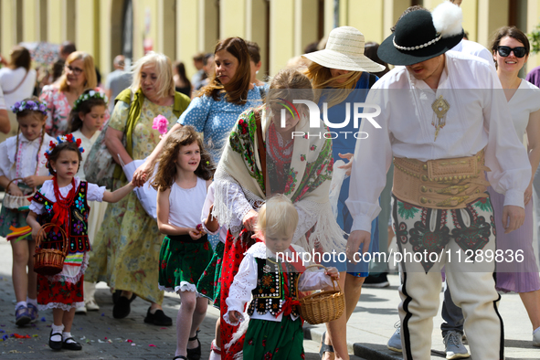 The Corpus Christi procession is walking through the city streets in Krakow, Poland, on May 30, 2024. The Solemnity of the Most Holy Body an...