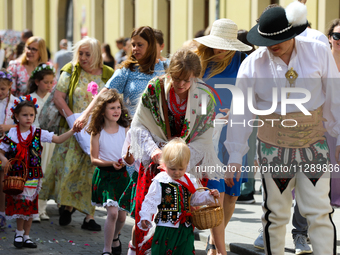 The Corpus Christi procession is walking through the city streets in Krakow, Poland, on May 30, 2024. The Solemnity of the Most Holy Body an...