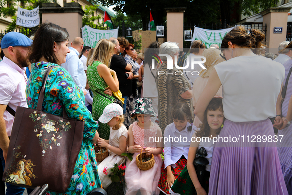 The Corpus Christi procession is walking through the city streets in Krakow, Poland, on May 30, 2024. The Solemnity of the Most Holy Body an...