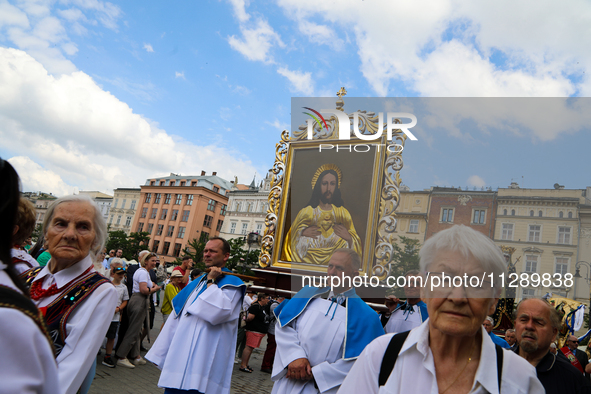 The Corpus Christi procession is walking through the city streets in Krakow, Poland, on May 30, 2024. The Solemnity of the Most Holy Body an...