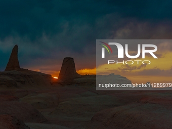 The Yadan landform landscape of the Devil City scenic area in the desert Gobi is being seen at sunset after strong winds in Karamay, China,...