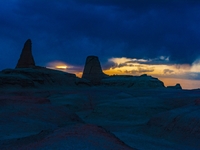 The Yadan landform landscape of the Devil City scenic area in the desert Gobi is being seen at sunset after strong winds in Karamay, China,...